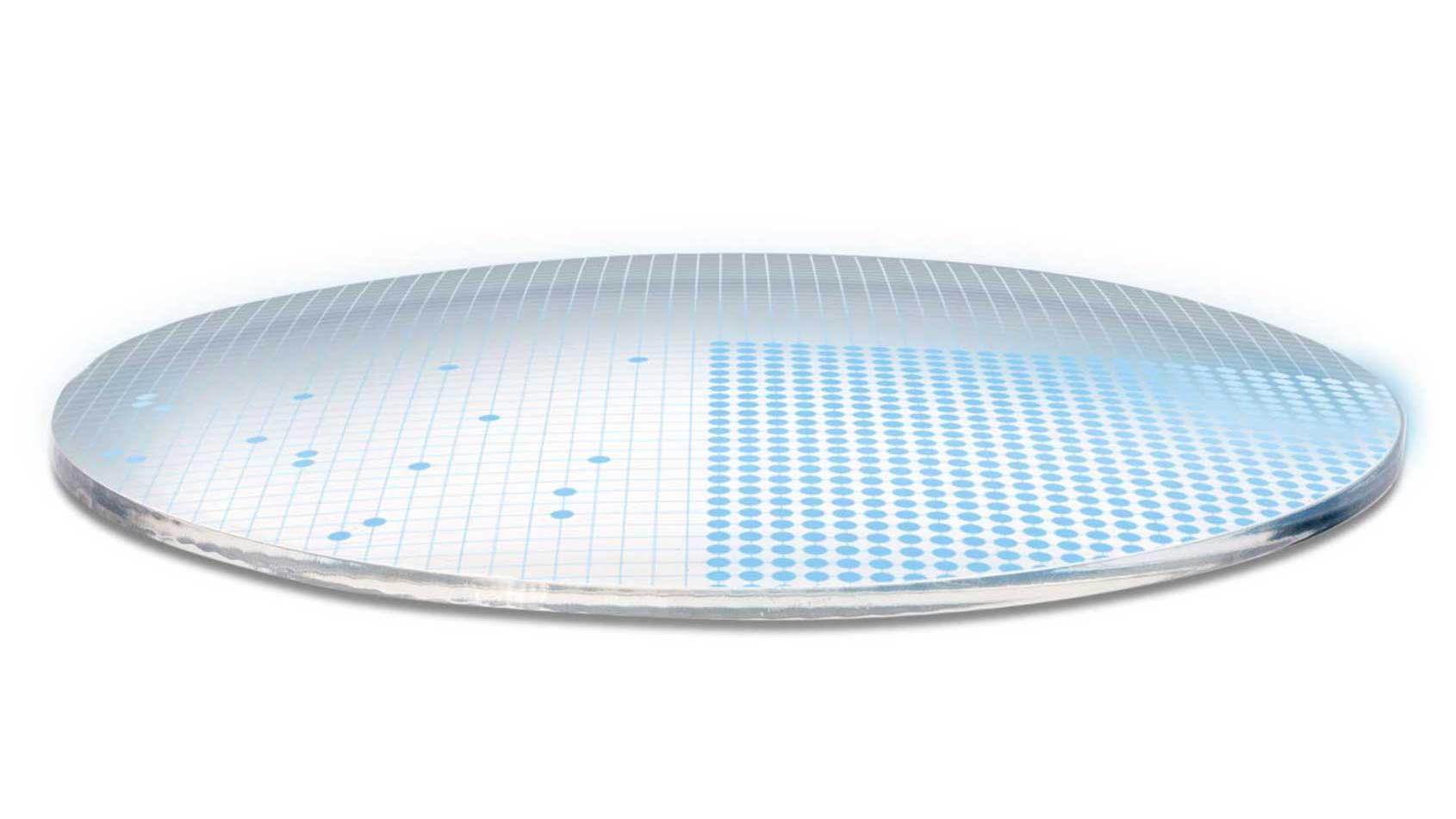 Trójwymiarowa ilustracja soczewki przedstawiająca 700 niebieskich kropek symbolizujących 700 parametrów zapewniających bardzo złożoną powierzchnię soczewki.