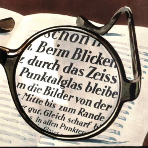 Zdjęcie starej reklamy soczewek ZEISS Punktal pokazującej wyraźny obraz na całym obszarze soczewki. W 1912 r. było to rewolucyjne rozwiązanie. 