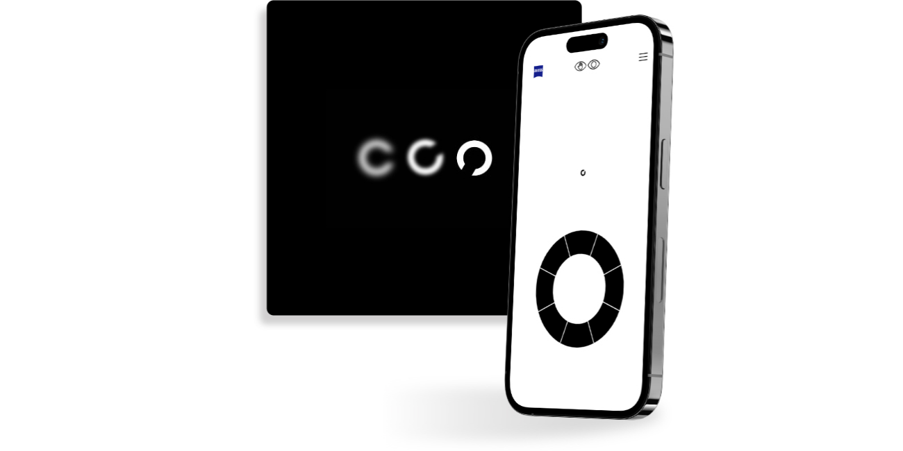 Smartfon z widokiem ekranu przesiewowego testu wzroku ZEISS, na którym widać czarny okrąg podzielony na segmenty, często używany w testach wzroku. 