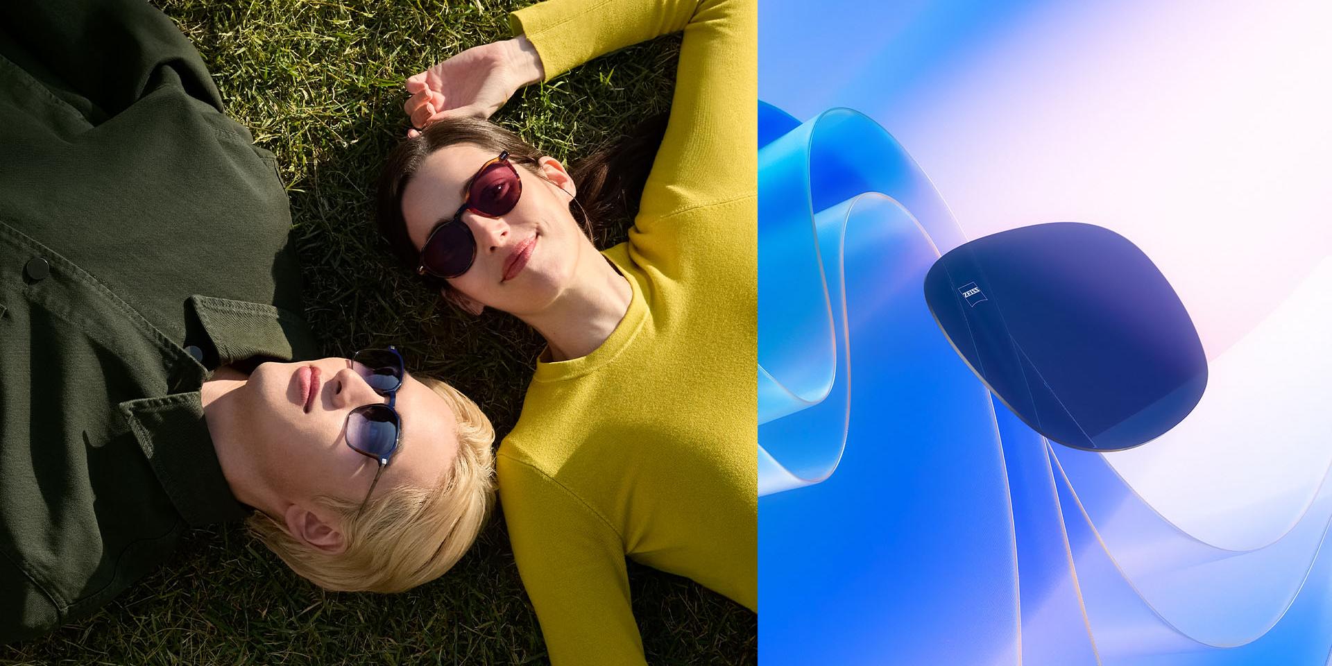 Mężczyzna i kobieta w okularach przeciwsłonecznych ZEISS z mocą korekcyjną, relaksujący się na trawie i spoglądający w niebo. Wygenerowana komputerowo wizualizacja barwionej soczewki skierowanej w stronę światła słonecznego, ilustrująca jej zdolność blokowania promieni UV