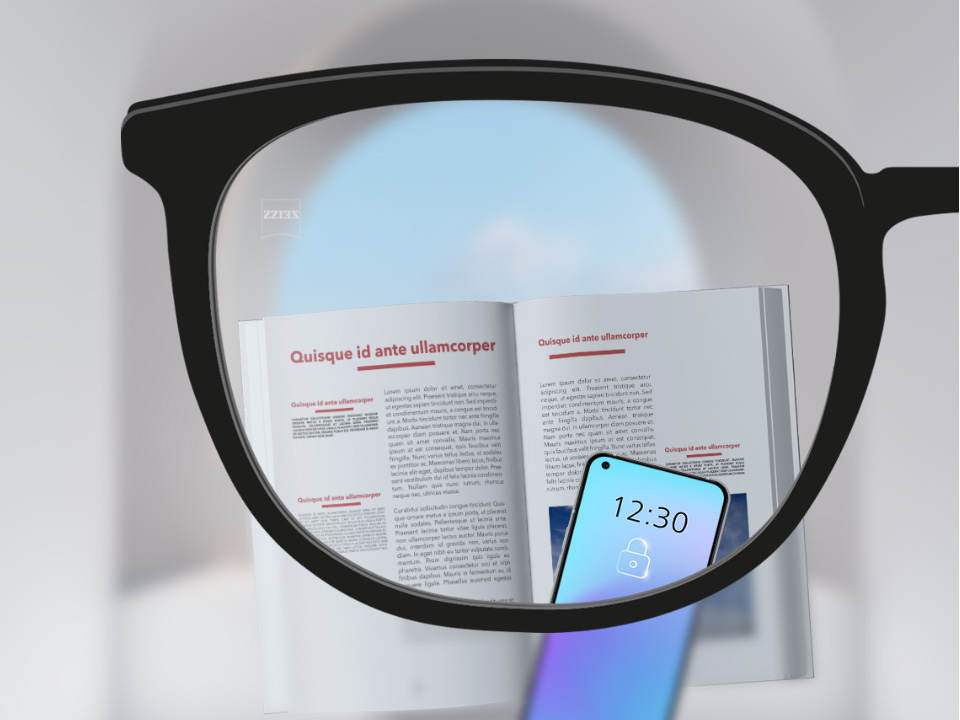 Punkt widzenia z soczewkami jednoogniskowymi ZEISS SmartLife ze smartfonem i książką, obraz widziany przez soczewkę jest w pełni wyraźny.