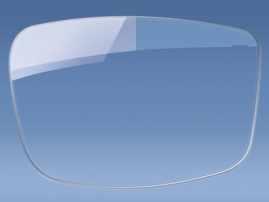 Obraz soczewki okularowej z powłoką antyrefleksyjną i bez niej 